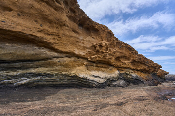 Volcanic cliff at Playa Amarilla