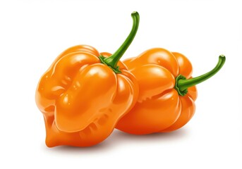 Two habanero peppers on a plain background