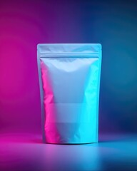 A stand-up pouch, silver, with a blank label, is illuminated by vibrant pink and blue neon light against a dark background