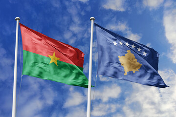 Flags of Burkina Faso and Kosovo Waving Together Against a Blue Sky, Symbolizing Diplomatic Relations and Global Connections