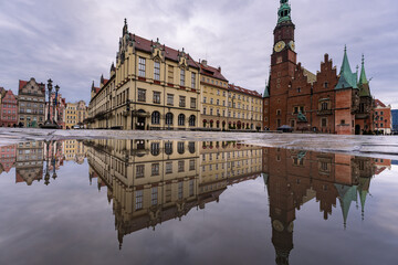 Wroclaw, Poland: Reflecton of the medieval market square and the ancient city hall building in the in Wroclaw old town in Poland.
