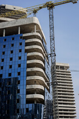 process of glazing a high building facade