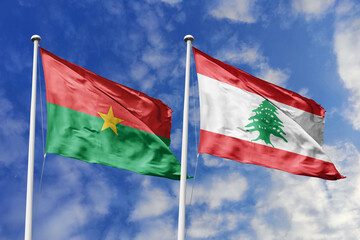 Flags of Burkina Faso and Lebanon waving together under a bright sky, symbolizing unity, peace, and...
