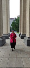 NOVAT, NOVOSIBIRSK - 08 JUNE 2025: Opera and Ballet Theatre NOVAT.  Woman posing in Interior and facade and some details.