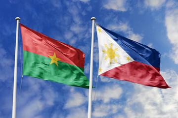 A Burkina Faso and Philippines flag, a metaphor for Asia-African unity, wave together against a...
