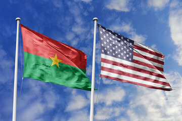 A Burkina Faso and US flag, a metaphor for transatlantic collaboration, wave together against a...