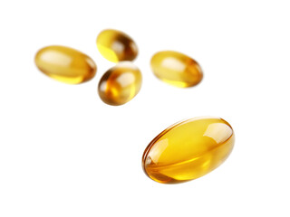 Golden omega-3 capsules isolated on a white background