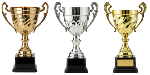 Collection of bronze, gold and silver winner trophies with shiny metal cups