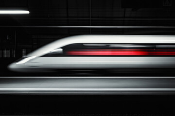 Fototapeta premium High speed train motion blur dark platform night travel speed