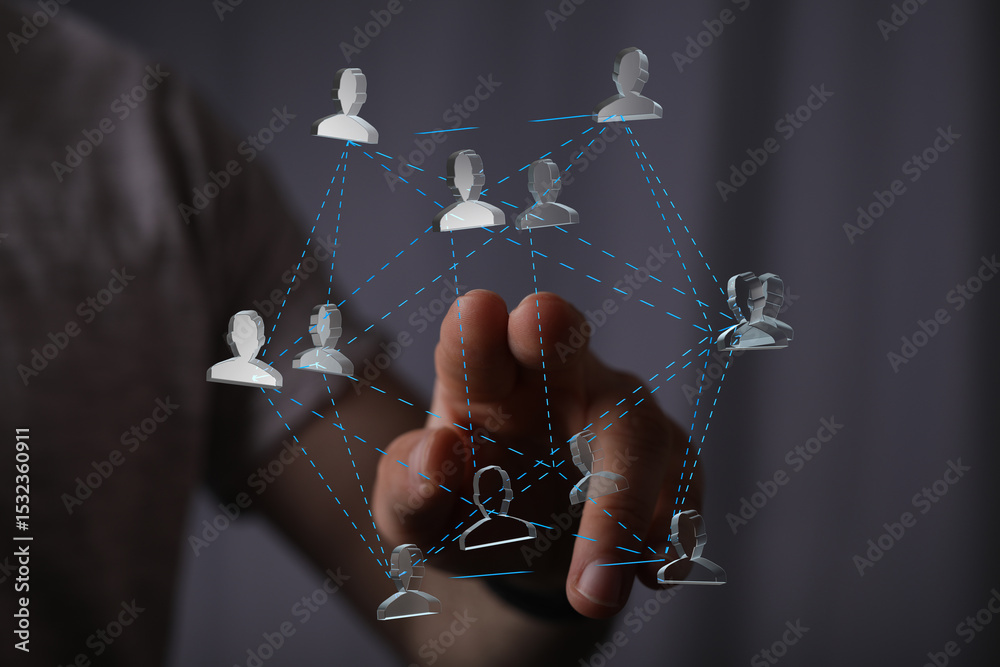 Poster hand interacts with a digital network of interconnected people, symbolizing global communication and
