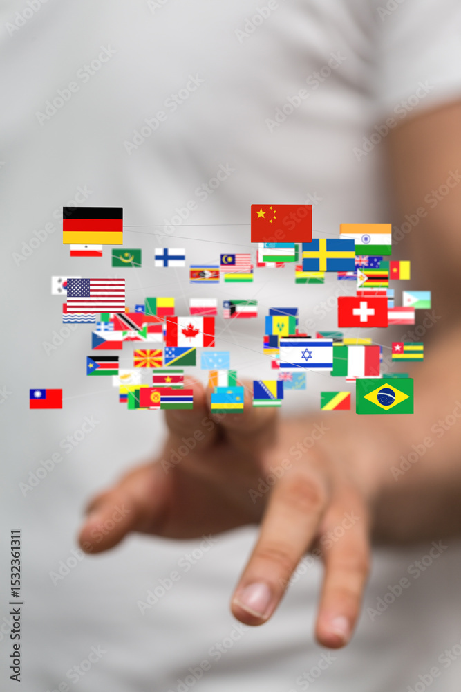 Aufkleber Image of a hand interacting with a network of world flags, symbolizing global connection and communication.