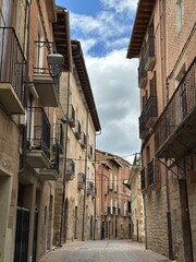 Fototapeta premium A street with buildings and a street