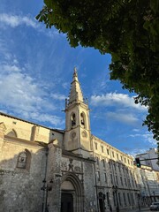 A large stone building with a clock tower