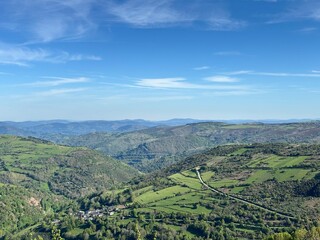 A landscape with trees and hills