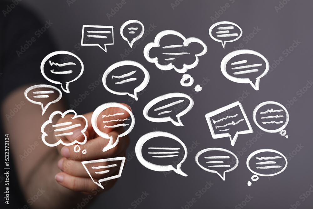 Poster image of hand interacting with speech bubbles, ideal for communication, dialogue, and conversation c