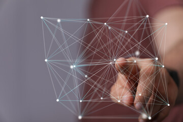 Abstract image of a finger interacting with a digital network, representing connection and data...
