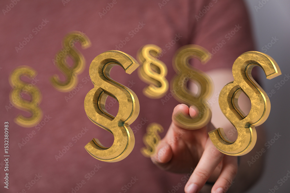 Aufkleber abstract image of golden paragraph symbols floating above a hand, representing legal concepts.