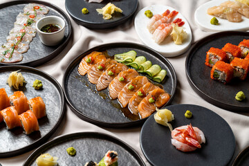 A vibrant display of sushi showcases various styles and ingredients, highlighting fresh seafood artistry. Each piece is artfully arranged, inviting diners to indulge in flavors