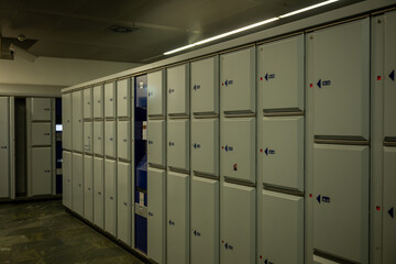 Luggage lockers at train station terminal for secure baggage storage and passenger convenience
