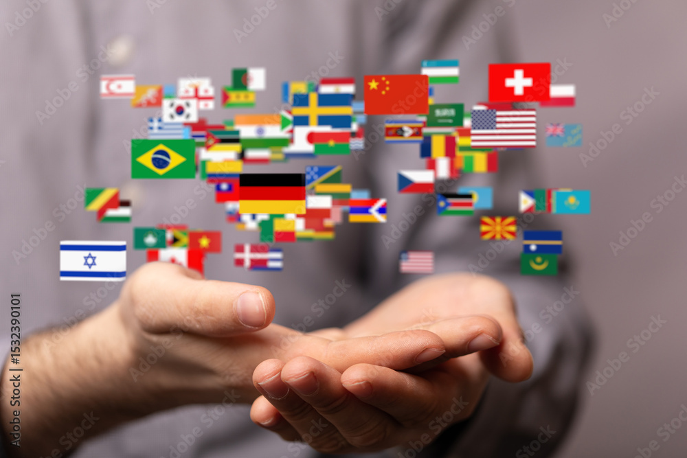Poster image of hands holding various flags, symbolizing global connection and international collaboration.
