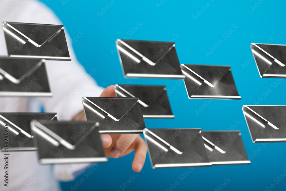 Aufkleber hand interacting with digital email icons, symbolizing email management and inbox organization.