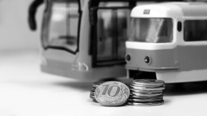 Russian coins and public transport toys, black and white image.