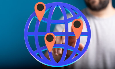 Person interacting with a 3D globe showing multiple location points, representing global reach or...