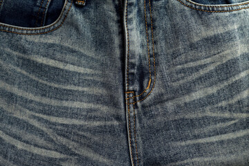 front pocket of blue jeans, denim Faded pants texture.