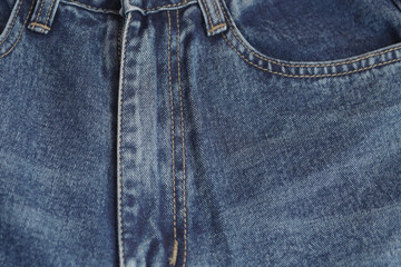 Jeans pants. front pocket of blue jeans, denim texture.