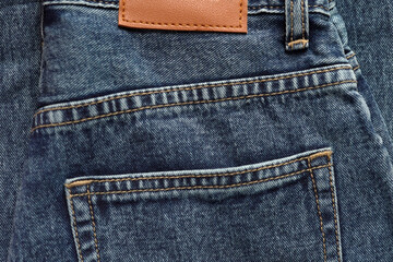 Jeans pants. back pocket of blue jeans, denim texture.