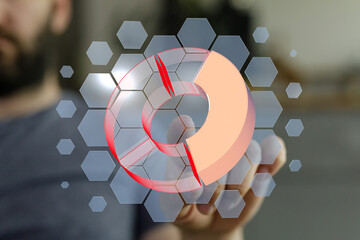 Person interacts with a 3D pie chart on a touchscreen device.  Data visualization concept.