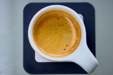 a cup of coffee seen from above