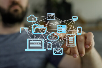 Image depicts a person interacting with a digital network, showing seamless file access across devices and cloud storage.