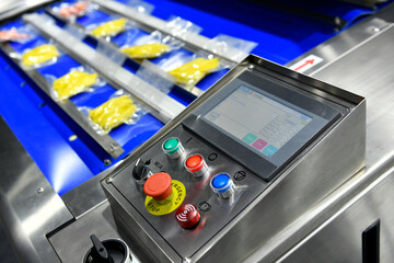Control panel of industrial machine are wrap food products food in production lines, food production industry