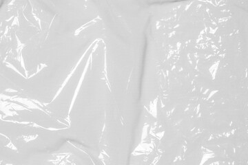plastic overlay texture of realistic crumpled transparent plastic film wrap on black...