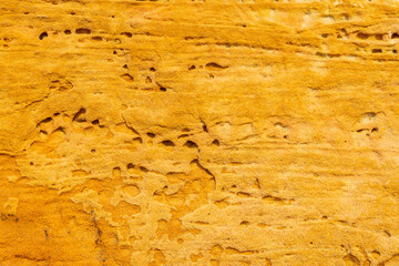 Yellow stone wall texture, natural materials
