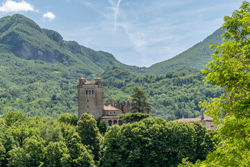 The ancient Rocchetta Mattei immersed in the greenery of the Apennines, Grizzana Morandi, Italy