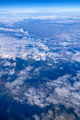 Aerial view from Ryanair flight, stunning landscapes, mountains, rivers, coastlines, and clouds from Memmingen to Malaga journey