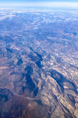 Aerial view from Ryanair flight, stunning landscapes, mountains, rivers, coastlines, and clouds from Memmingen to Malaga journey