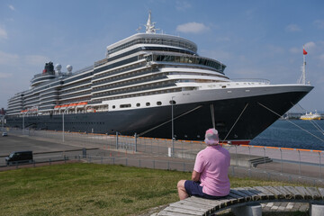 Classic ocean liner cruiseship cruise ship Elizabeth in port of Aomori, Japan with skyscraper...