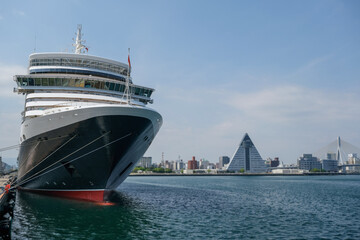 Classic ocean liner cruiseship cruise ship Elizabeth in port of Aomori, Japan with skyscraper...