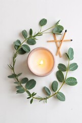 Calmness and Serenity: a soft candle light with the addition of leaves and matchsticks evokes a peaceful scene and warm ambient.