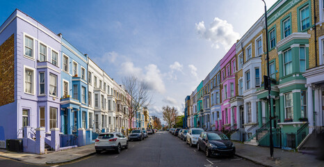 Colorful houses lining a street in notting hill, london