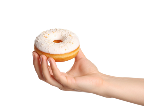 white glazed donut in hand black background