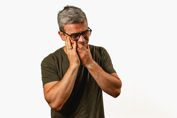 Man showing a mix of emotions in a comfortable setting