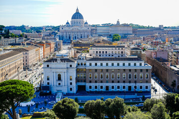 Saint peter's basilica dominating the skyline of rome from a high vantage point