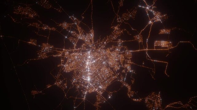 Taraz (Kazakhstan) top view at night. View on modern city from satellite. Camera is zooming in, rotating counterclockwise. Vertical video. The north is on the left side