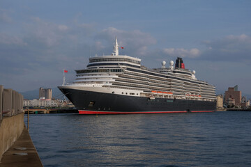Classic ocean liner cruiseship cruise ship Elizabeth in port of Aomori, Japan with skyscraper...