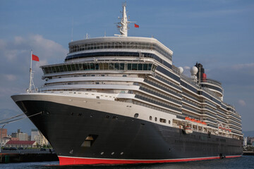 Classic ocean liner cruiseship cruise ship Elizabeth in port of Aomori, Japan with skyscraper...