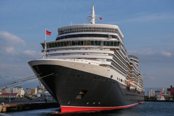 Classic ocean liner cruiseship cruise ship Elizabeth in port of Aomori, Japan with skyscraper...
